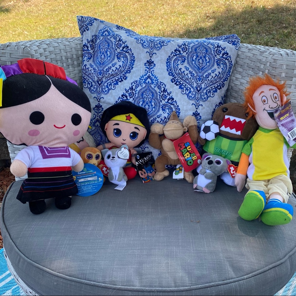 bundle of character stuffed animals with tags